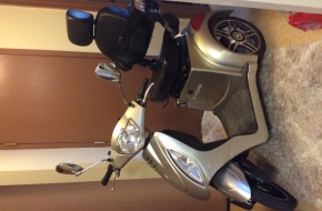 Like new gold 3 wheel  electric mobility scooter