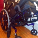 Gliding wheelchair